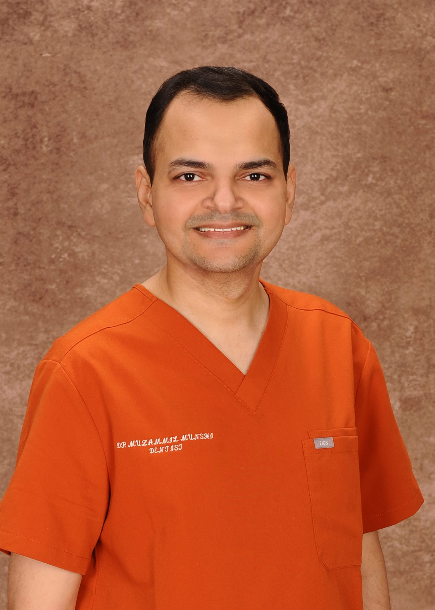 Portrait photo of Dr. Munshi